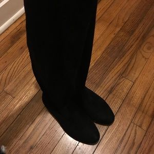 Above the knees black boots